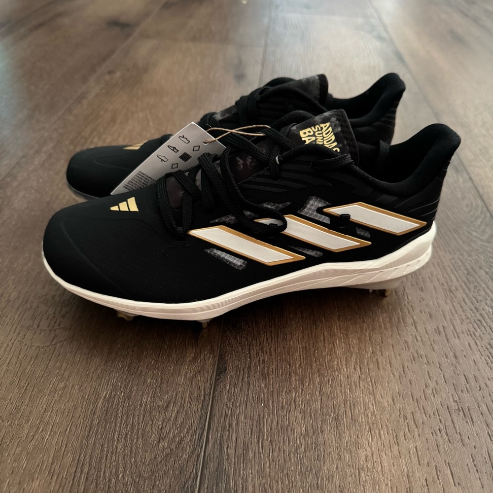 Adidas Core Black and Gold Cleats